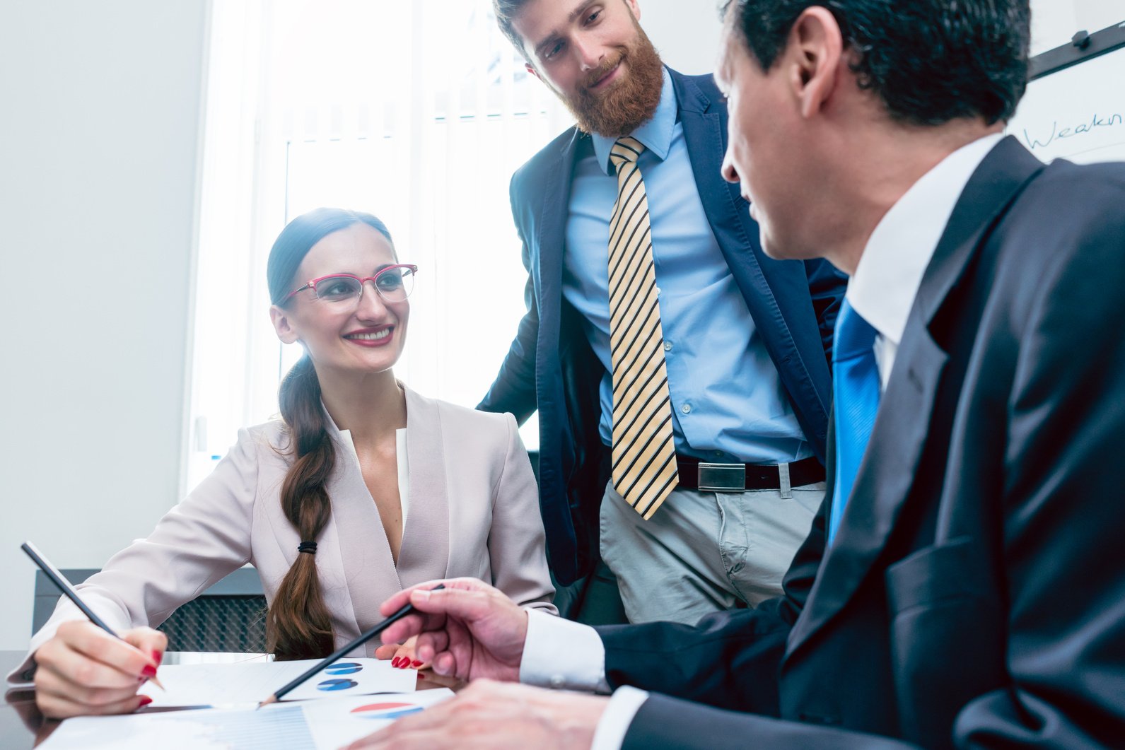 Business Analyst Smiling While Interpreting Financial Reports 